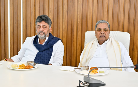 Shivakumar Touches Siddaramaiah's Feet, Seeks Blessings at Breakfast Meeting