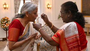 President Murmu Feeds Customary 'dahi-cheeni' to FM Sitharaman