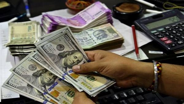 Rupee falls to record low against US dollar