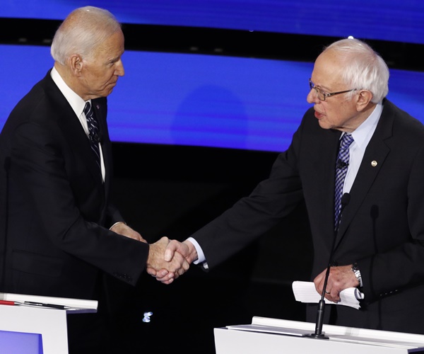 joe biden and bernie sanders shake hands