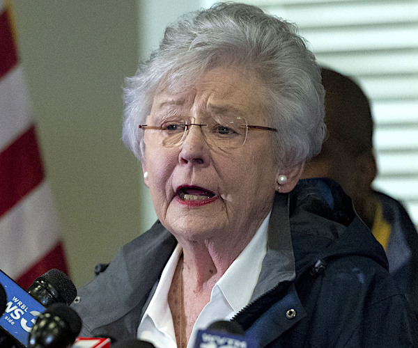 Kay Ivey speaks to the media