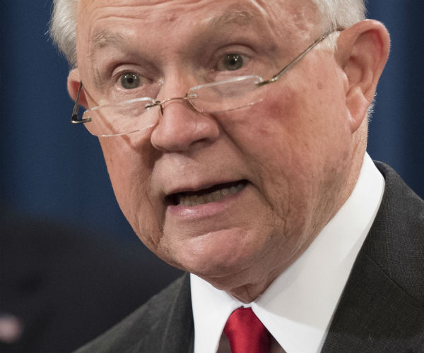 former attorney general jeff sessions is show with glasses tipping off his nose