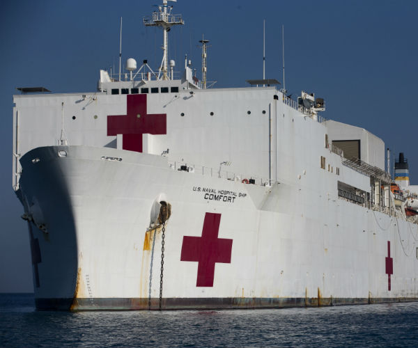 usns comfort navy hospital ship is shown with red crosses on the front