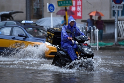 Beijing Lifts Red Alert for Flooding as Water Level Recedes