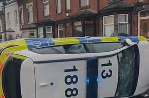 Police Car Flipped Over, Bus Set on Fire in Leeds as Riot Breaks Out