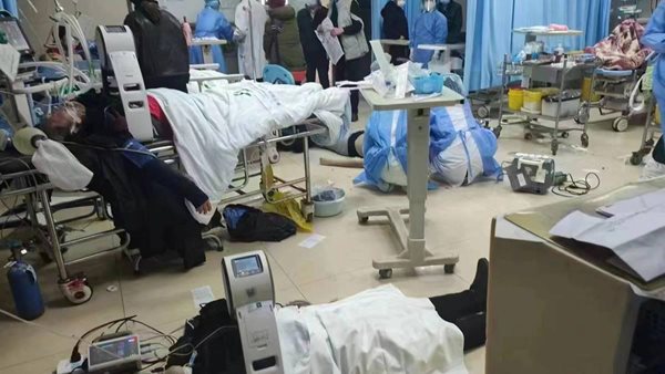 Bodies pile on top of each other in hospital morgues as Covid sweeps through Beijing
