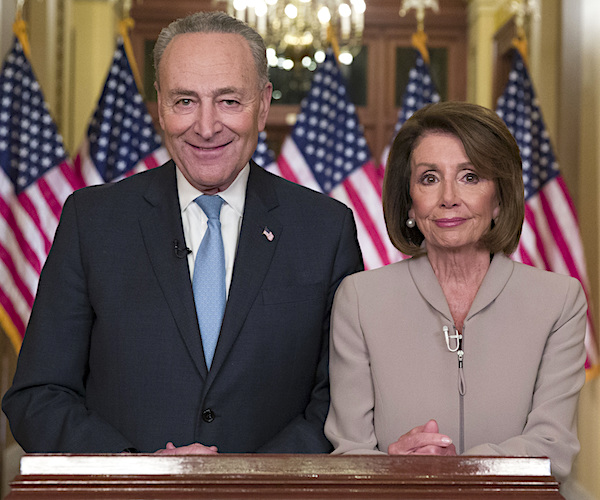 chuck schumer and nancy pelosi stand shoulder to shoulder to deliver their rebuttal to the state of the union