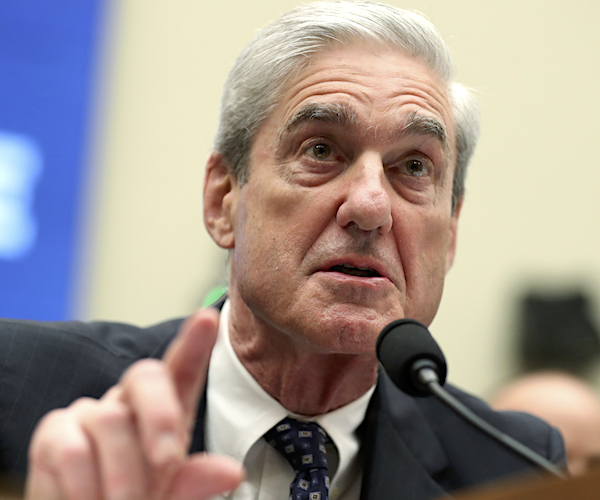 special counsel robert mueller points and speaks during congressional testimony