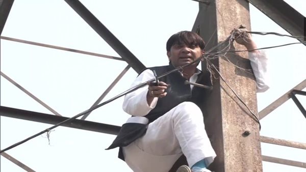 Denied ticket for MCD polls, ex-AAP Councillor climbs atop transmission tower