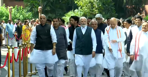 PM Modi Walks to New Parliament Building with Cabinet Colleagues, MPS